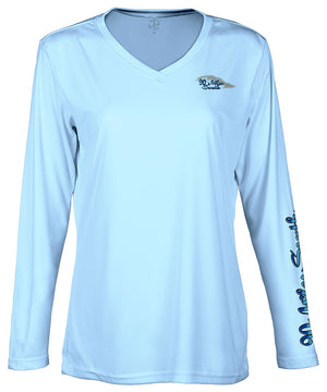 front view of a ladies light blue v-neck performance shirt with 90 Miles South Island left chest logo and right sleeve copy saying “90 Miles South”