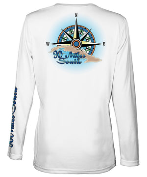 Ladies Cuban t-shirt | back view of a white long sleeve performance v-neck t-shirt depicting a blue green compass rose artwork and outline of the island of Cuba