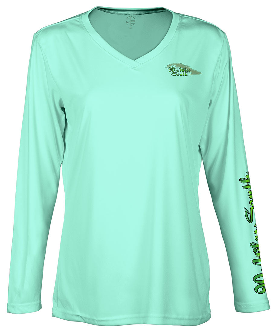 Ladies V-Neck | back view of a sea foam green long sleeve performance v-neck t-shirt depicting a green compass rose artwork and outline of the island of Cuba