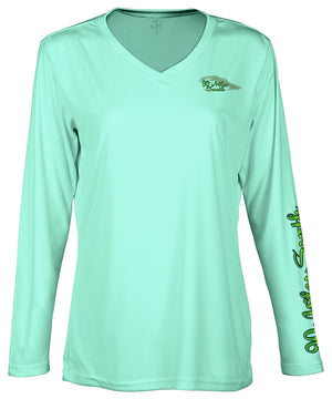 front view of a ladies sea foam green v-neck performance shirt with 90 Miles South Island left chest logo and right sleeve copy saying “90 Miles South”