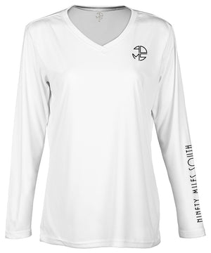 front view of a ladies white v-neck performance shirt with 90 Miles South Round left chest logo and right sleeve copy saying “90 Miles South”