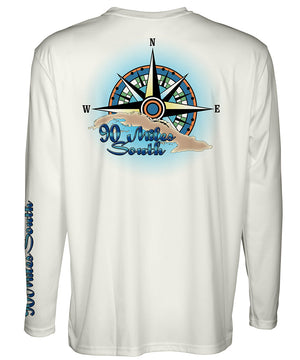 Cuban T-Shirt | Blue Compass Rose - back view of a light tan long sleeve performance t-shirt depicting blue compass rose artwork and outline of the island of Cuba 