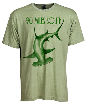 Front view of short sleeve heather green tee shirt with dark green artwork of 90 Miles South Hammerhead Shark