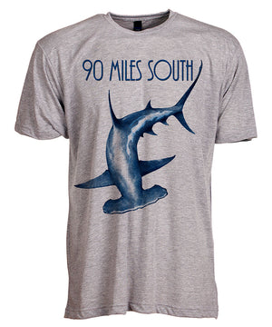 Front view of short sleeve heather grey tee shirt with blue artwork of 90 Miles South Hammerhead Shark