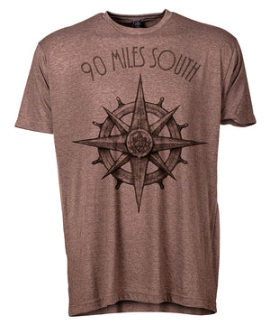 Front view of short sleeve heather brown tee shirt with dark brown artwork of 90 Miles South compass