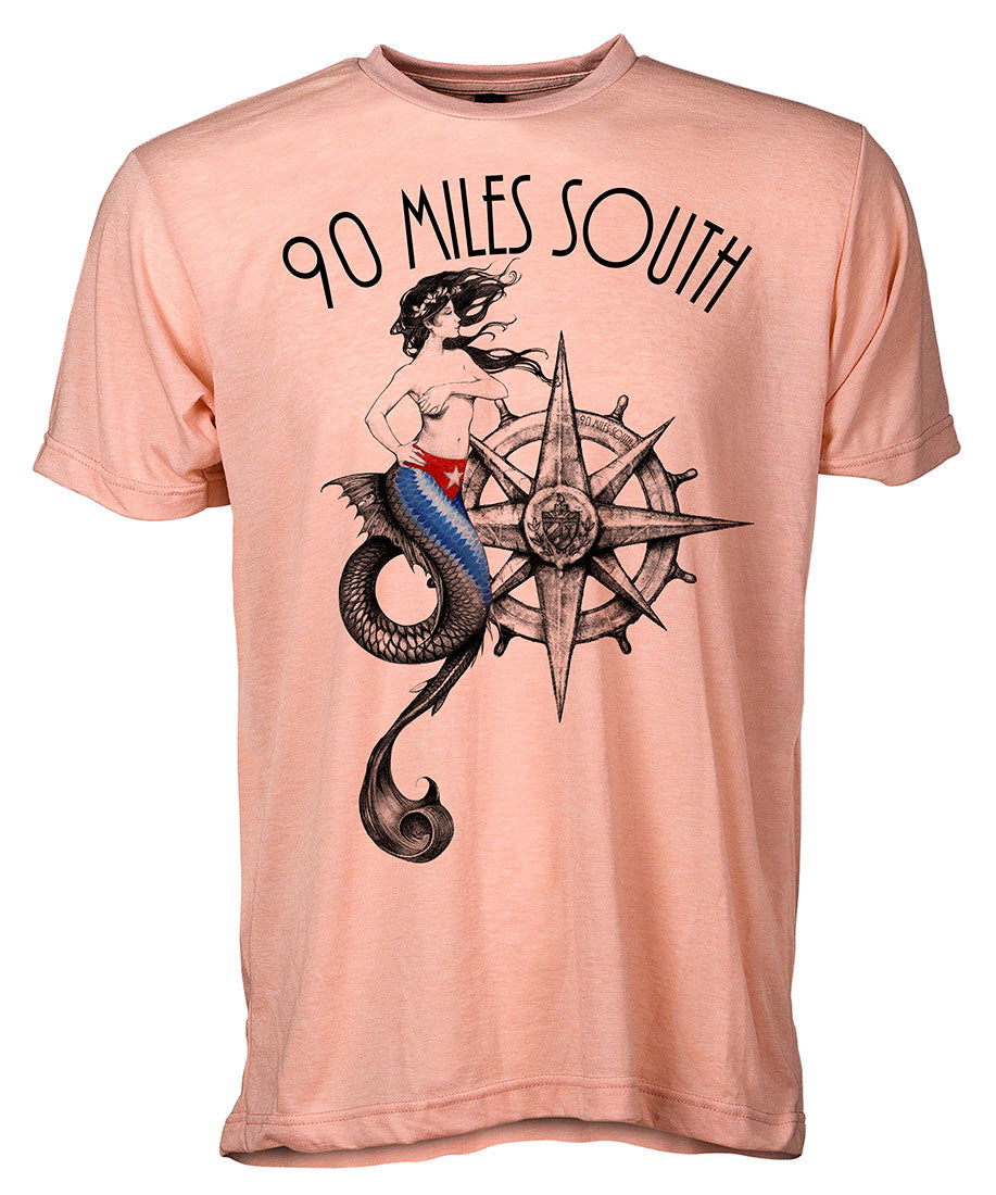 Front view of short sleeve peach tee shirt with black artwork of 90 Miles South Mermaid